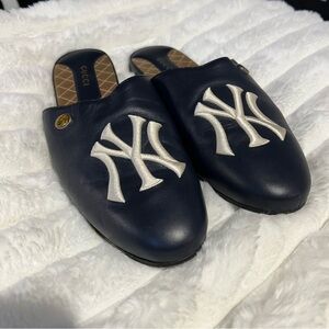 Gucci Quilted Black and Gold Mules